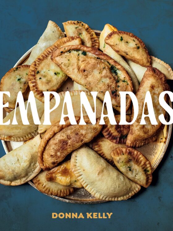 Empanadas: Cookbook cover with a pile of empanadas featured