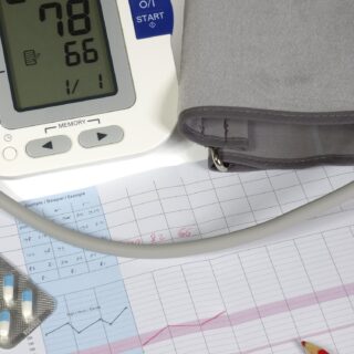 Hypertension Notifications: Digital Blood Pressure machine and note pad