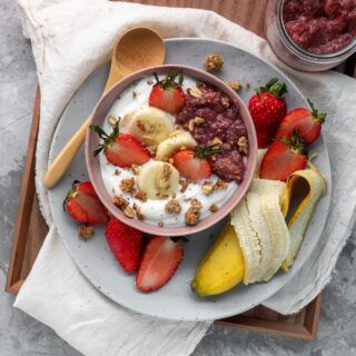 Probiotic Yogurt: Yogurt Parfait with granola and fruit in a bowl