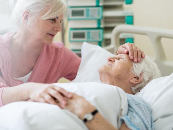 Palliative Care: Daughter visiting her senior mother in hospital