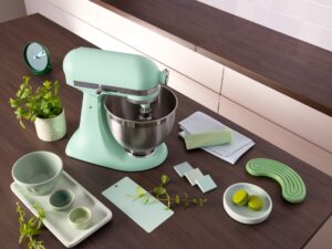 KitchenAid’s 2026 Colour of the Year: Stand mixer surrounded by kitchen accessories