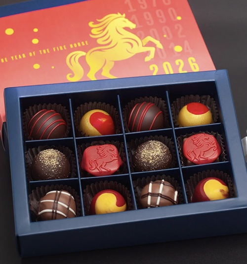 Year of the Horse: Stubbe Year of the Horse Lunar New Year Truffles in an open box featuring 12 chocolates