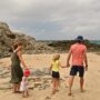 Family Trips: Family walking on the beach