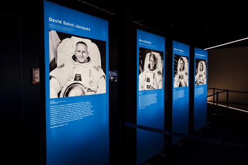 Space Explorers: The Infinite: Poster art with astronauts' biographies