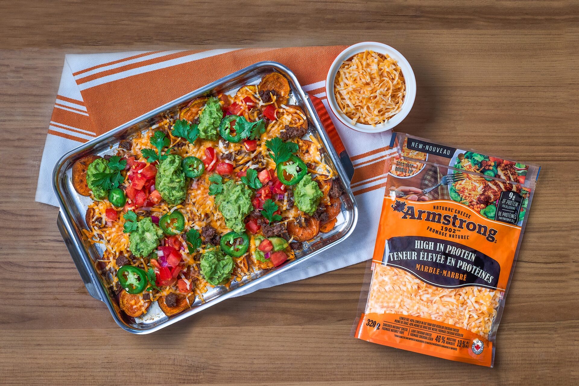 High-Protein Cheese: Casserole next to a package of shredded Armstrong Cheddar Cheese