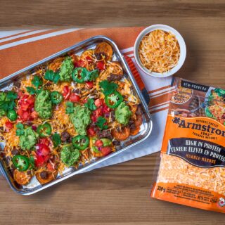 High-Protein Cheese: Casserole next to a package of shredded Armstrong Cheddar Cheese