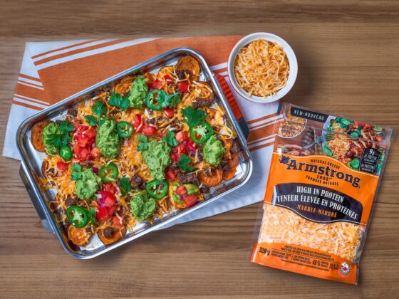 High-Protein Cheese: Casserole next to a package of shredded Armstrong Cheddar Cheese