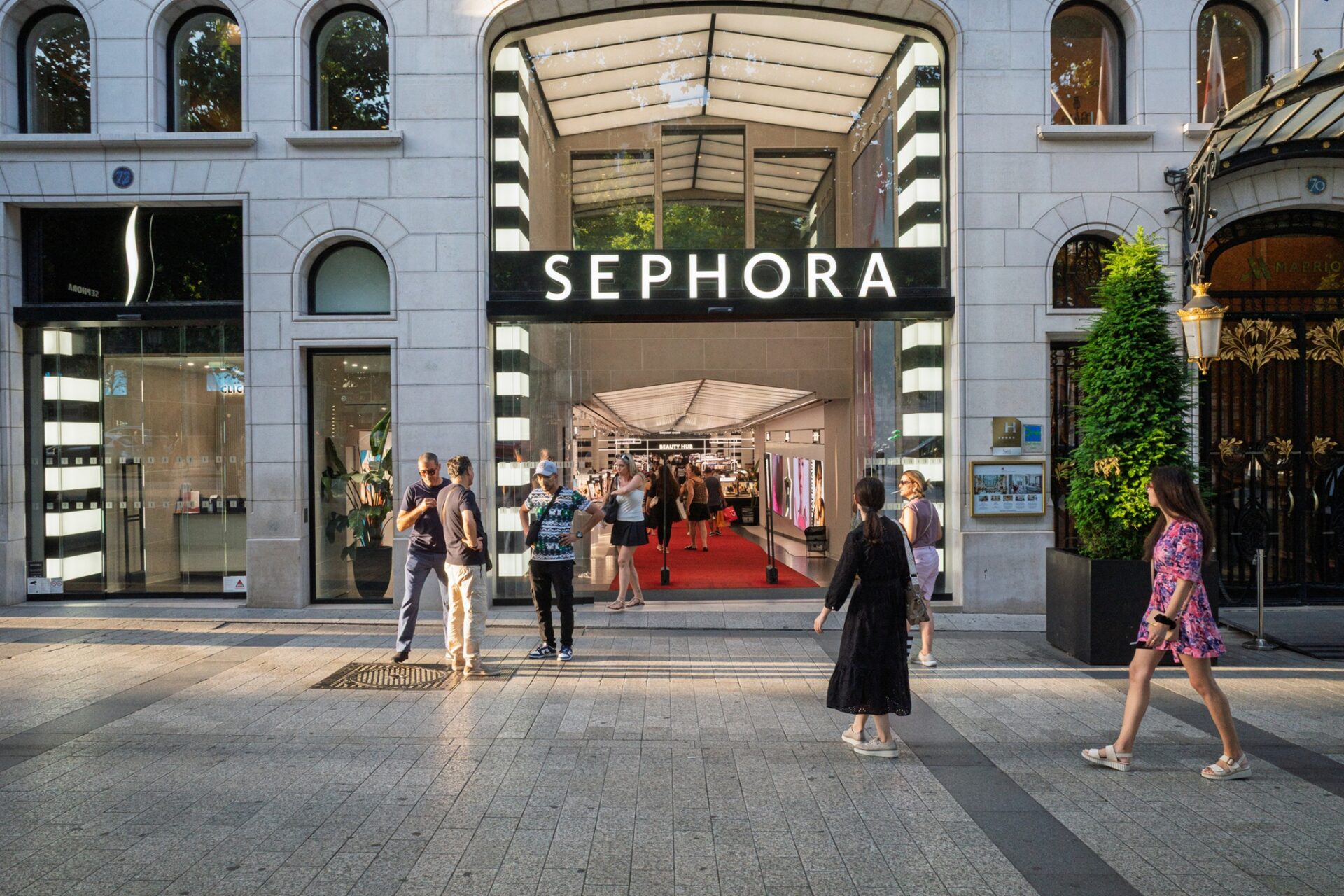 2026 Sephora Spring Savings Event: The iconic Sephora flagship store entrance on the Champs-Elysees, Paris, France, with people entering and exiting.