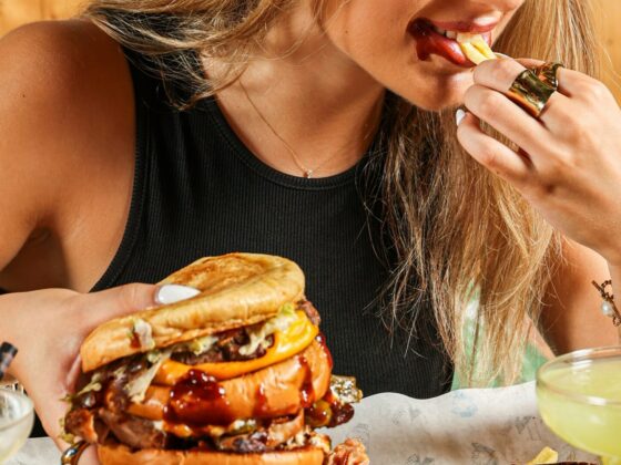 Burger: Girl eating a burger, retro diner, juicy burger, sandwiches and handhelds, fries, take-out, fast food
