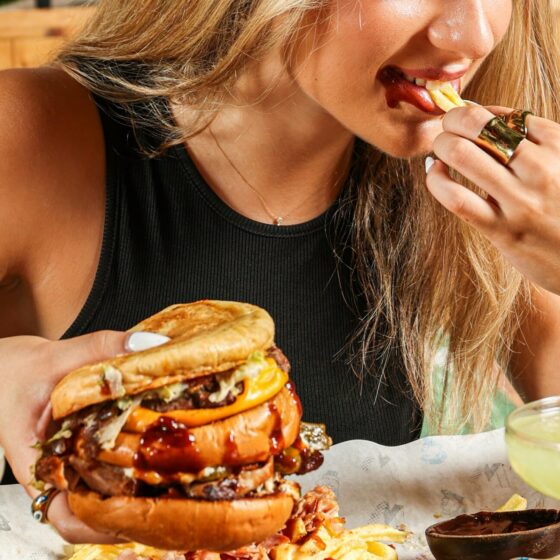 Burger: Girl eating a burger, retro diner, juicy burger, sandwiches and handhelds, fries, take-out, fast food