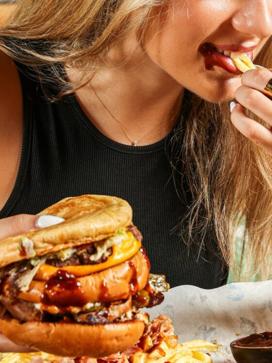 Burger: Girl eating a burger, retro diner, juicy burger, sandwiches and handhelds, fries, take-out, fast food
