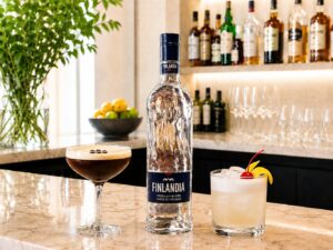 Cocktail Culture: Finlandia Vodka Bottle with a cocktail on either side on a bar