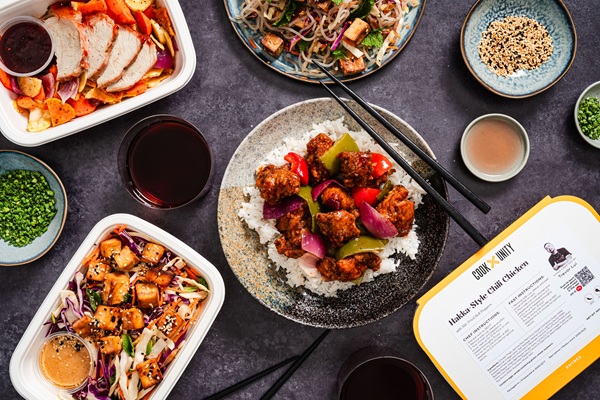 Chef Trevor Lui: Various Asian inspired meals plated and in Cook Unity packages