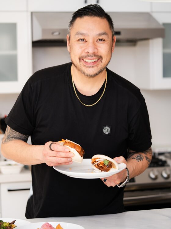 CookUnity: Chef Trevor Lui holding a bao