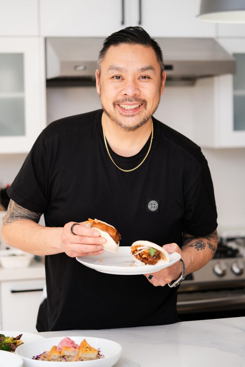 CookUnity: Chef Trevor Lui holding a bao