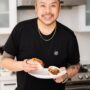 CookUnity: Chef Trevor Lui holding a bao