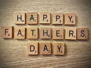 Father's Day Gift Guide: Scrabble tiles spelling out Happy Father's Day