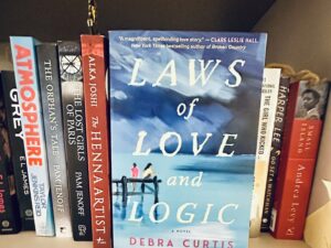 Laws of Love and Logic: Book facing forward on a book shelf with other books