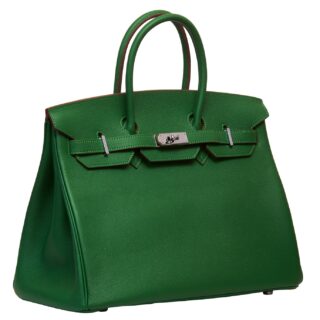 Handbags: Women's green leather handbag isolated on white background
