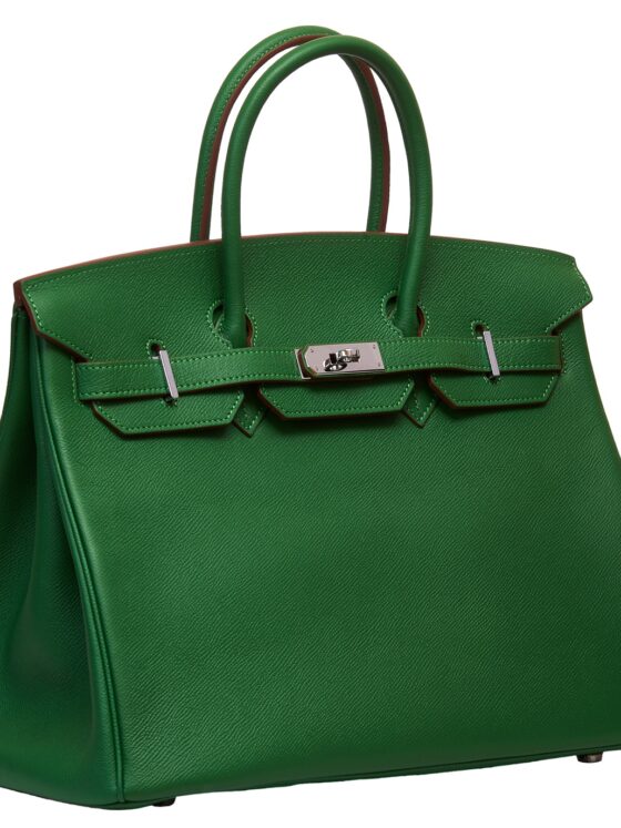 Handbags: Women's green leather handbag isolated on white background