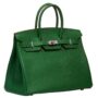 Handbags: Women's green leather handbag isolated on white background