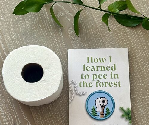 How I Learned to Pee in the Forest : Book with a roll of toilet paper and stem of a green plant