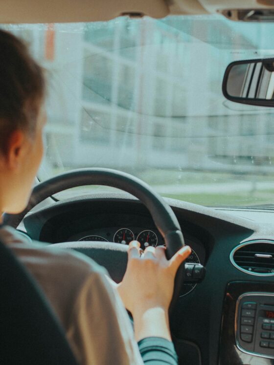 Driving School: Teenager behind the wheel of the car (interior shot)