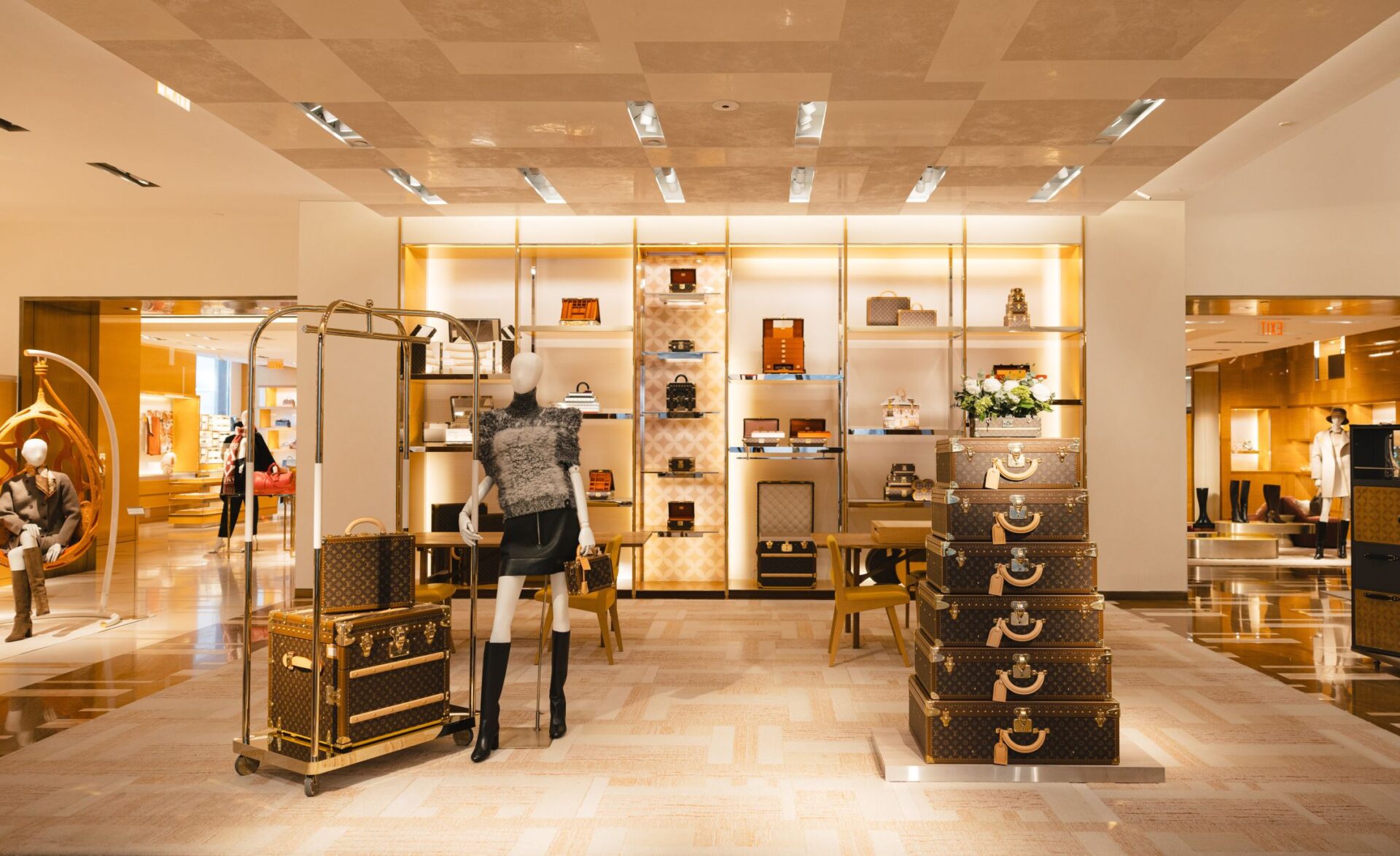Savoir-Faire Toronto: Wide shot of the entrance of the Louis Vuitton Store in Yorkville with trunks visible
