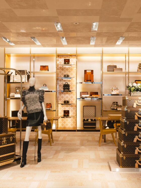 Savoir-Faire Toronto: Wide shot of the entrance of the Louis Vuitton Store in Yorkville with trunks visible
