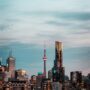 Playing Online Casino Games: Downtown Toronto Skyline at dusk including the CN Tower