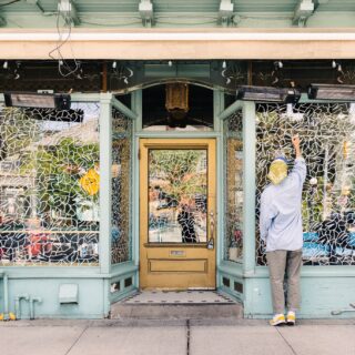 The Window Project: Artist Lucas Beaufort drawing on DaiLo's window
