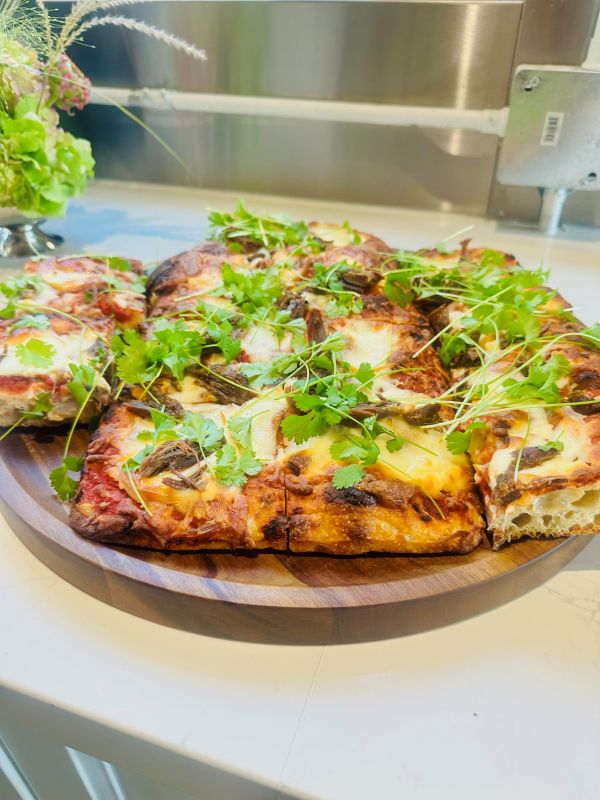 Sourdough: Roman Style Pizza on a wooden platter