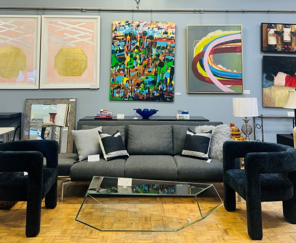 Shop Consignment: Gray and Black Living Room Group with clear, lucite table and abstract art in the background